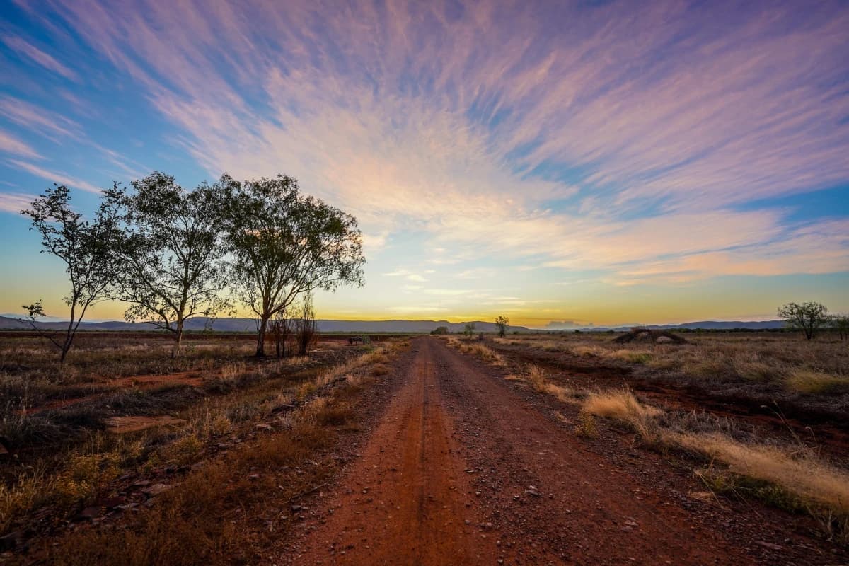 Open landscape at sunset with dramatic sky